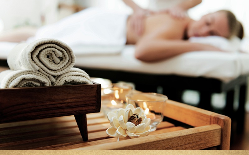a person lying on a bed