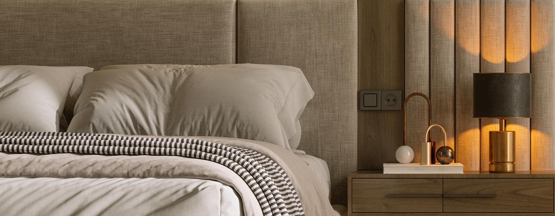 a bed with a white comforter